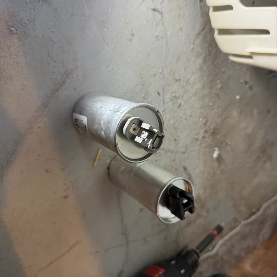 Old capacitor next to the new one